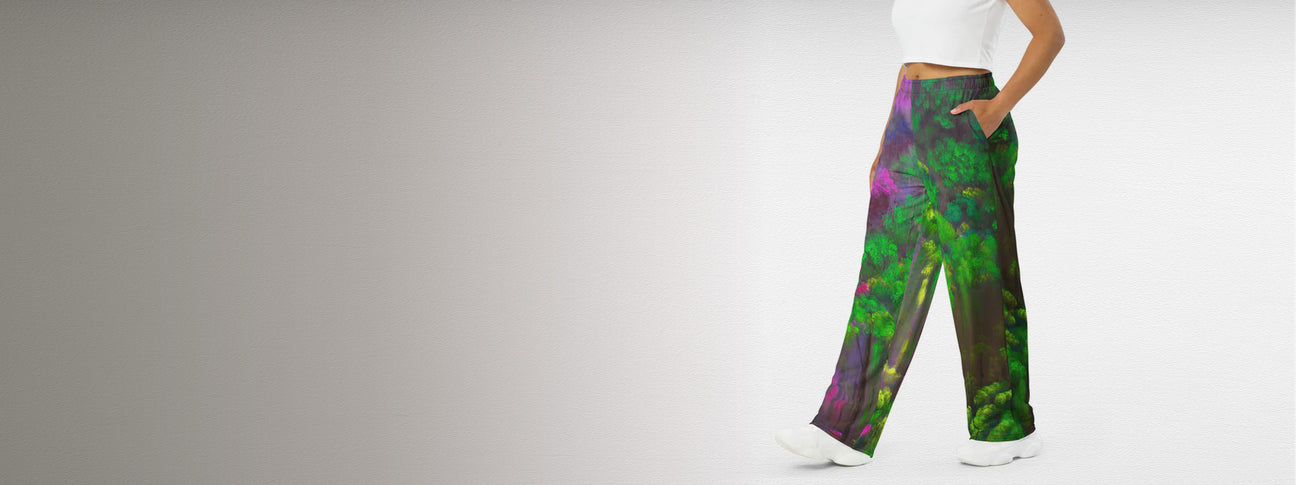 Person wearing colorful pants on a plain background